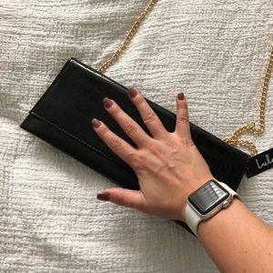 black snakeskin clutch